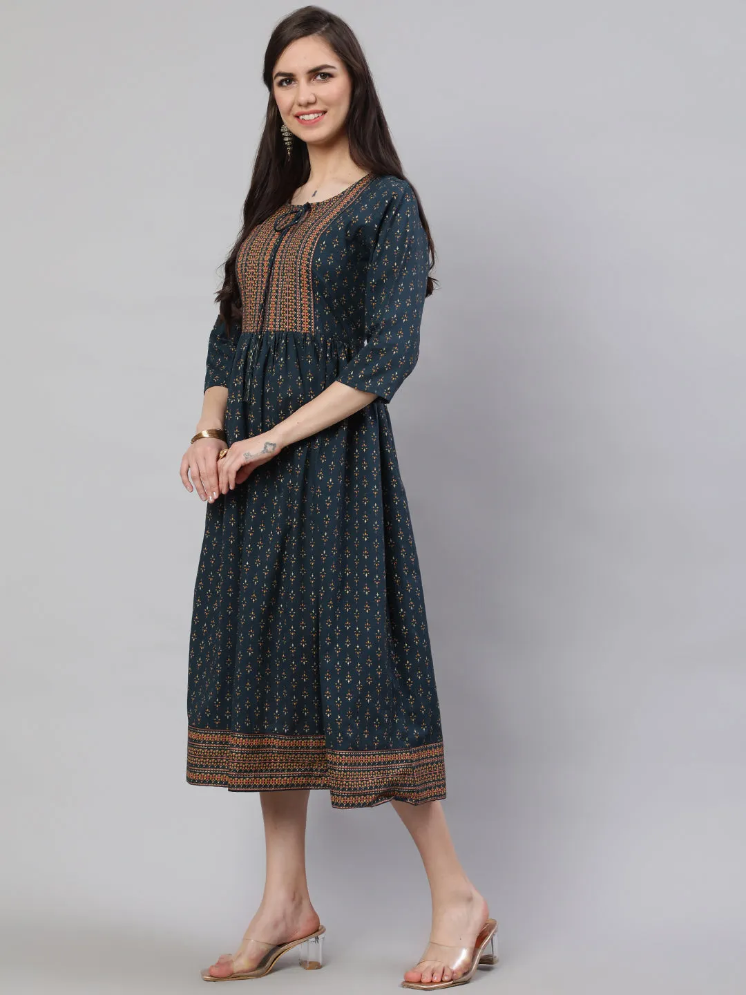 Women Teal Blue Ethinc Printed Flared Dress With Three Quarter Sleeves